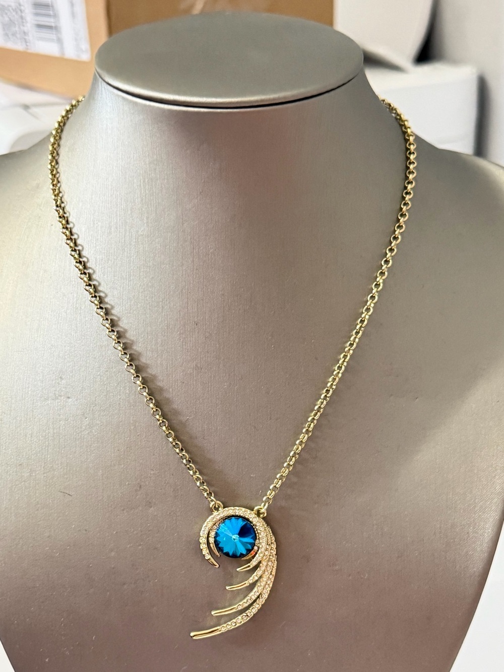Gold Pendant Necklace with Blue Crystal Accent